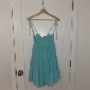 Lucy in the Sky brand new babydoll dress with adjustable straps and tie back.